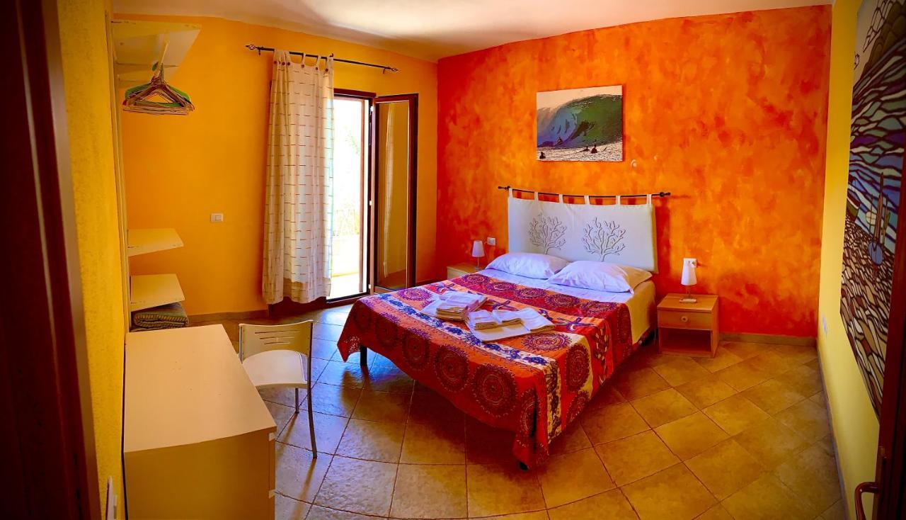 Aparthotel Residenze L'Isola Surf House à Porto Pollo Extérieur photo