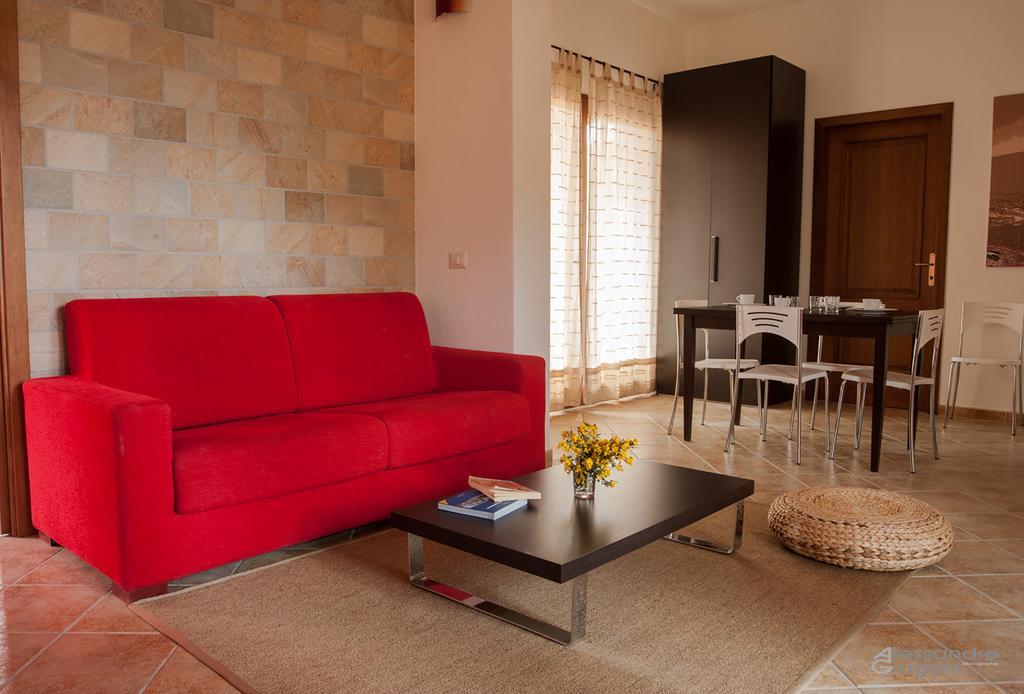 Aparthotel Residenze L'Isola Surf House à Porto Pollo Chambre photo