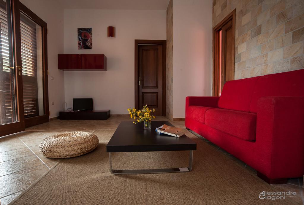 Aparthotel Residenze L'Isola Surf House à Porto Pollo Chambre photo