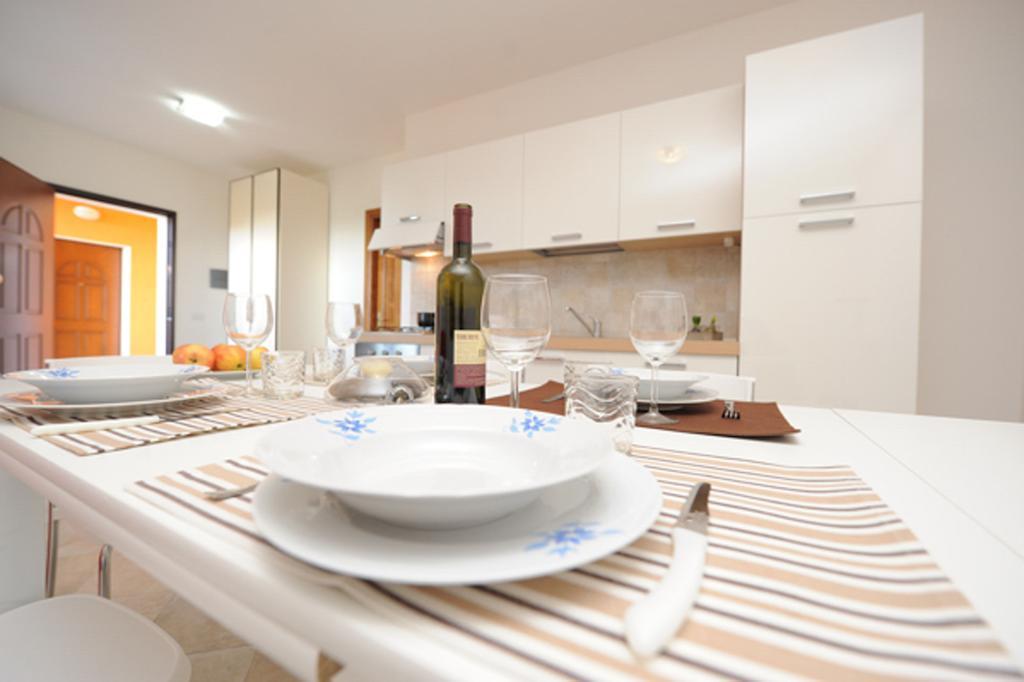 Aparthotel Residenze L'Isola Surf House à Porto Pollo Chambre photo
