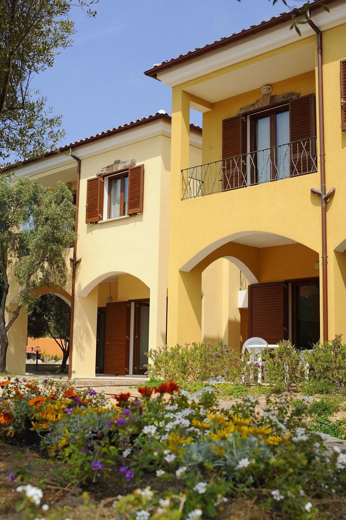 Aparthotel Residenze L'Isola Surf House à Porto Pollo Extérieur photo