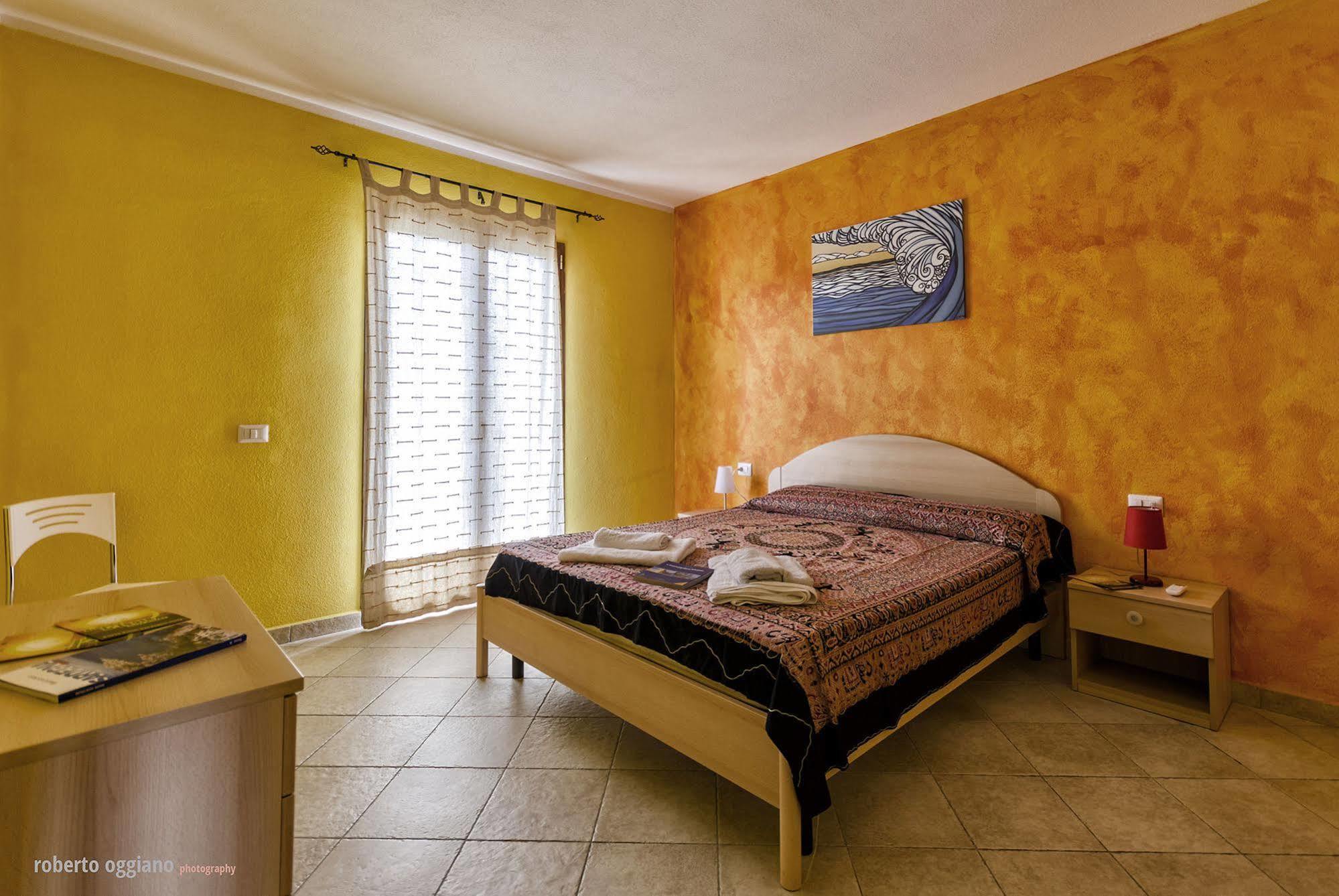 Aparthotel Residenze L'Isola Surf House à Porto Pollo Extérieur photo