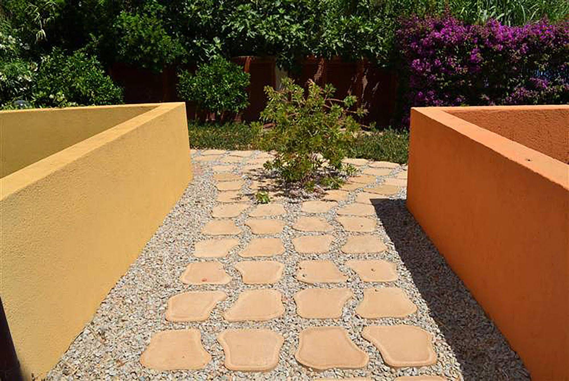 Aparthotel Residenze L'Isola Surf House à Porto Pollo Extérieur photo